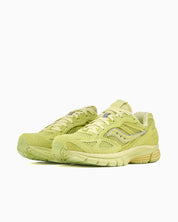 Sneaker Saucony ProGrid Guide 7 3sixteen Lime en mesh et suède premium vert avec amorti ProGrid et détails rétro-running raffinés.