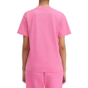 tee shirt jacquemus rose basique , oversize , avec jaquemus écrit en haut a droite , vue de dos
