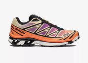 Salomon XT-6 Black Almond Dragon Fire avec tige en mesh noir, renforts synthétiques, détails Almond et Dragon Fire, technologies Quicklace, SensiFit, EnergyCell et semelle Contagrip.