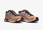 Salomon XT-6 Black Almond Dragon Fire avec tige en mesh noir, renforts synthétiques, détails Almond et Dragon Fire, technologies Quicklace, SensiFit, EnergyCell et semelle Contagrip.