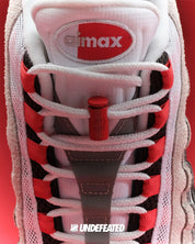 Sneakers Nike Air Max 95 SP Undefeated Geo Tokyo Bright Crimson en mesh et cuir avec motifs géométriques et unités Air visibles