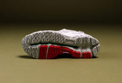 Sneaker ASICS Gel-Kayano 12.1 Up There Natsukashii Glacier Grey en mesh gris glacé avec amorti GEL et finitions premium exclusives.
