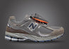 New Balance 2002R Grey Brown Pouch